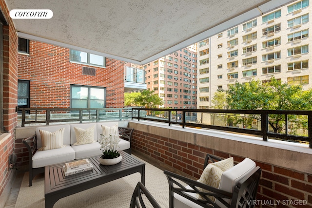 balcony with an outdoor hangout area