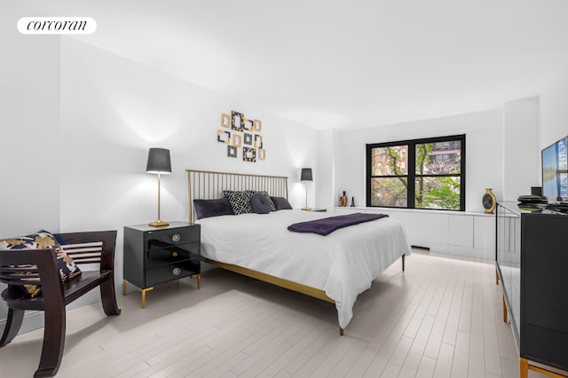 bedroom featuring light hardwood / wood-style floors