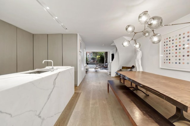 dining space with light hardwood / wood-style floors