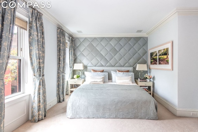 carpeted bedroom with ornamental molding