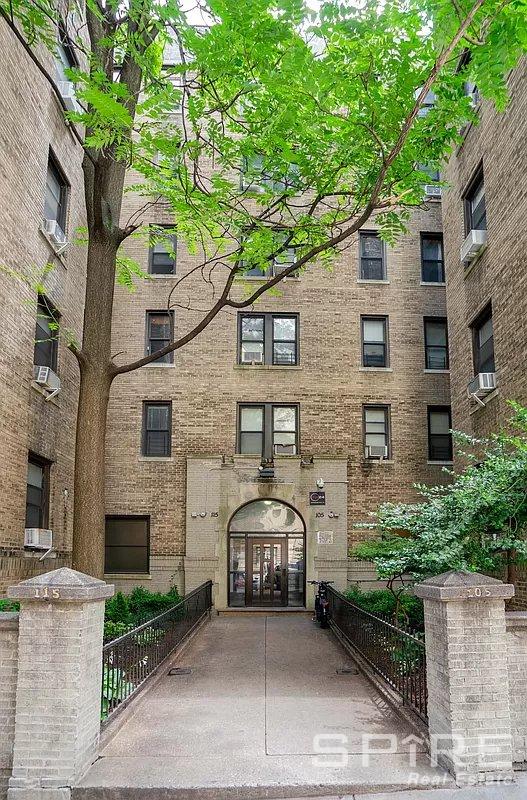 105 Bennett Ave Unit 24A, New York City, NY 10033 - view of apartment building / complex with cooling unit