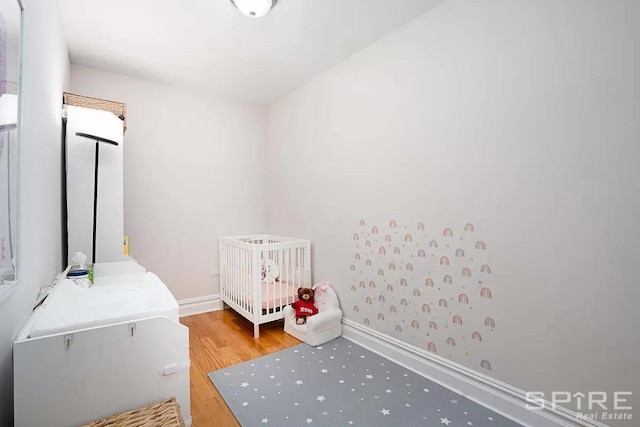 bedroom featuring hardwood / wood-style flooring