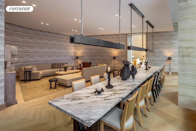 dining area featuring light parquet floors