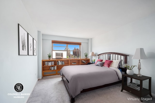 bedroom with light carpet