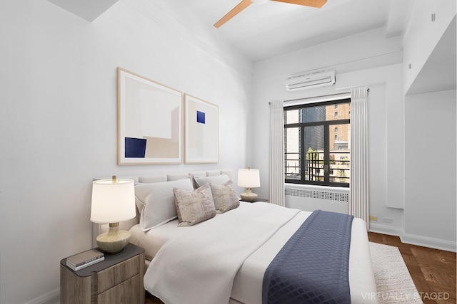 bedroom featuring radiator heating unit, a wall mounted air conditioner, a ceiling fan, and baseboards