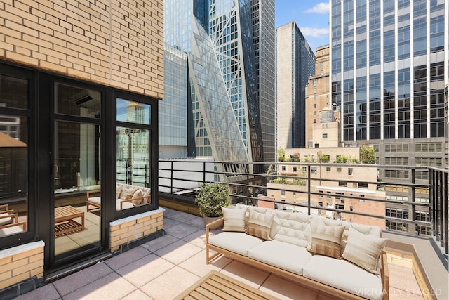 balcony featuring a view of city