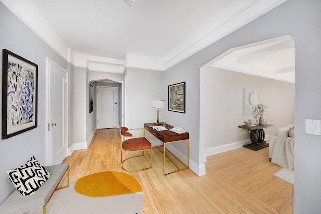 corridor with hardwood / wood-style floors