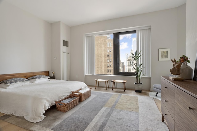 75 Wall St Unit 34M, New York City, NY 10005 - bedroom featuring light carpet