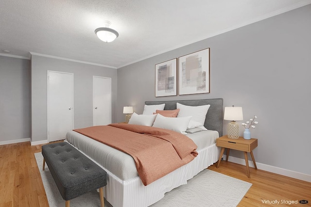 1818 Newkirk Ave Unit 1-N, New York City, NY 11226 - bedroom with ornamental molding, baseboards, and light wood finished floors