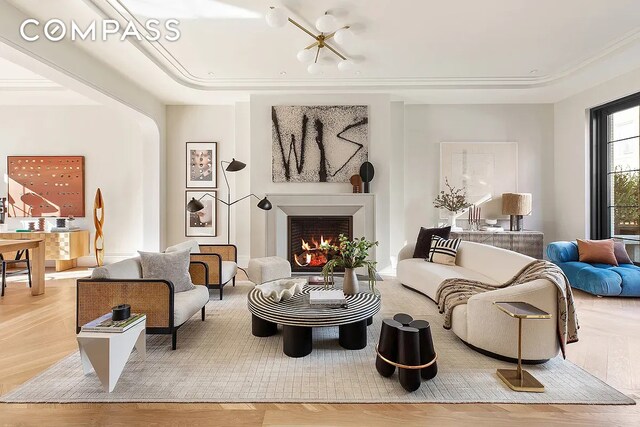 sitting room with light hardwood / wood-style floors