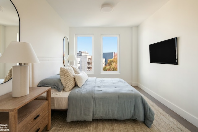 bedroom featuring baseboards