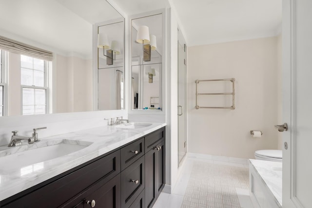 40 E 66th St Unit 4B, New York City, NY 10065 - full bath with toilet, tile patterned floors, double vanity, baseboards, and a shower stall