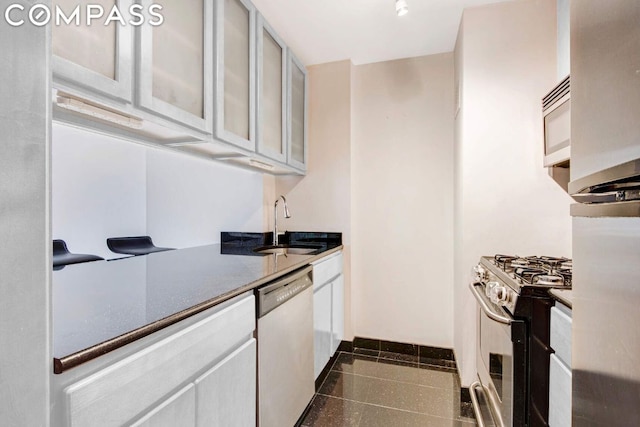 kitchen featuring appliances with stainless steel finishes and sink