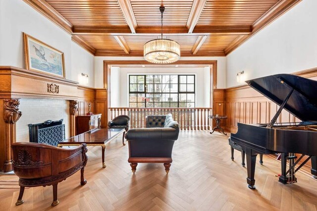 entryway featuring crown molding, light wood-type flooring, and french doors