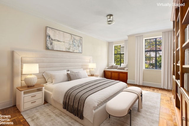 bedroom featuring light parquet flooring