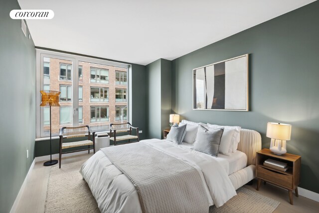 bedroom featuring light hardwood / wood-style flooring