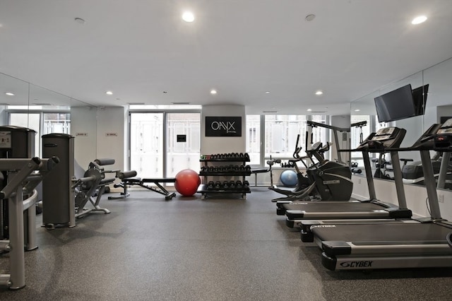 gym featuring recessed lighting