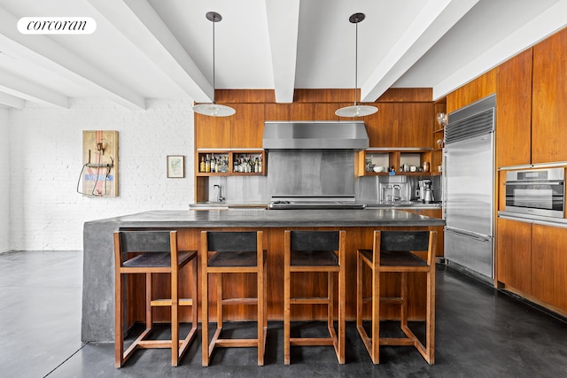 kitchen featuring wall chimney exhaust hood, stainless steel appliances, visible vents, and open shelves