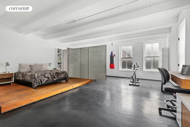 bedroom featuring concrete flooring, visible vents, and beamed ceiling