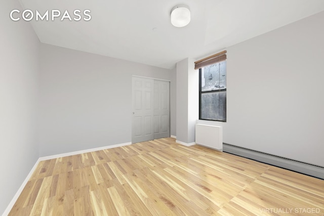 2792 Frederick Douglass Blvd Unit 2B, New York City, NY 10039 - unfurnished room featuring wood finished floors and baseboards