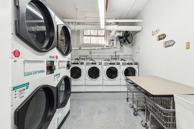 shared laundry area featuring stacked washing maching and dryer and independent washer and dryer