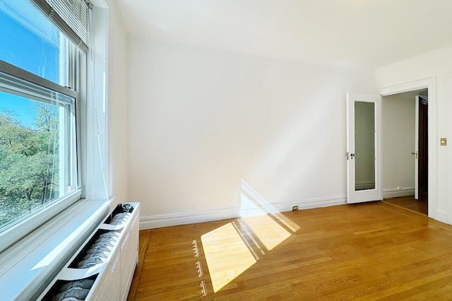 390 Riverside Dr Unit 5G, New York City, NY 10025 - empty room featuring wood finished floors and baseboards