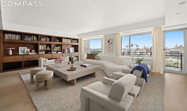 living room with light hardwood / wood-style floors