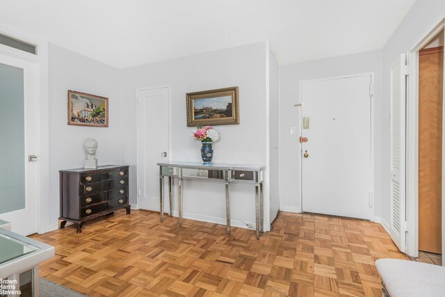 entrance foyer featuring baseboards