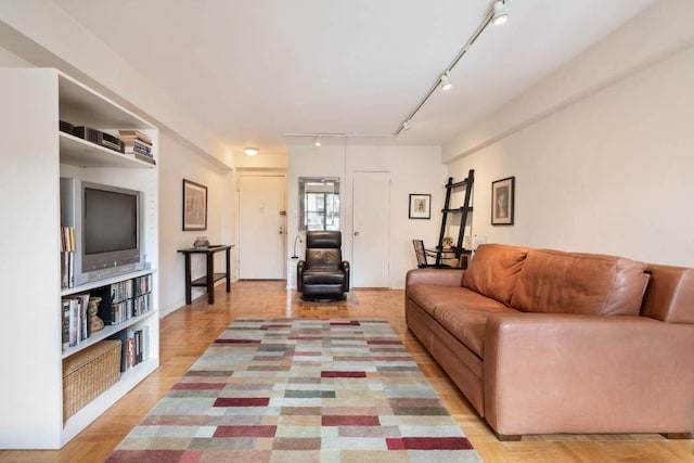 living room featuring track lighting