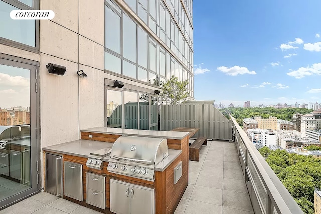 view of patio / terrace featuring grilling area and exterior kitchen