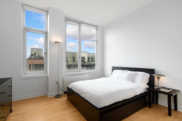 bedroom featuring light hardwood / wood-style floors