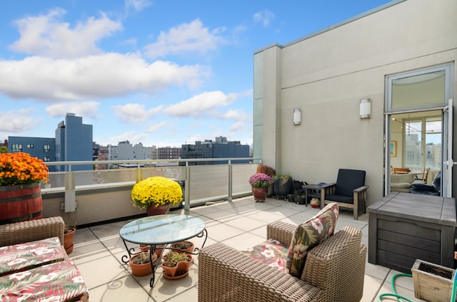 view of patio with a balcony