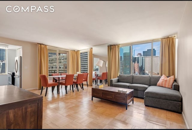 living room featuring light parquet flooring