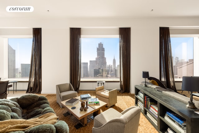 living room featuring a view of city and visible vents