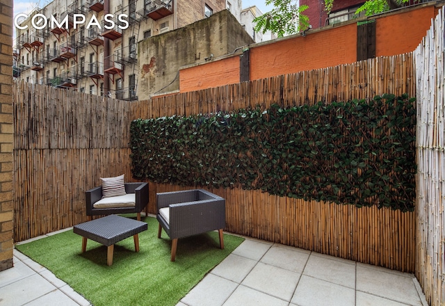 view of patio with fence