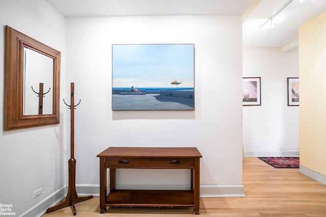 310 W 72nd St Unit 1D, New York City, NY 10023 - hallway featuring wood finished floors and baseboards