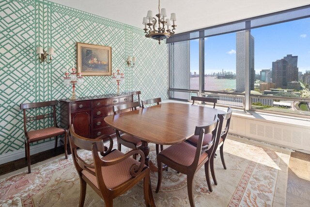 dining space with a chandelier