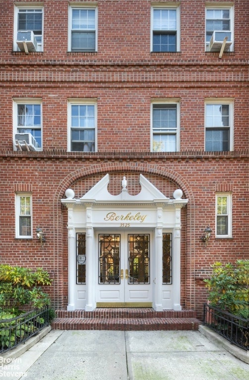 entrance to property featuring french doors