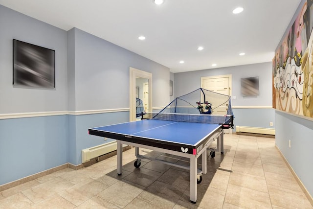 recreation room with baseboard heating