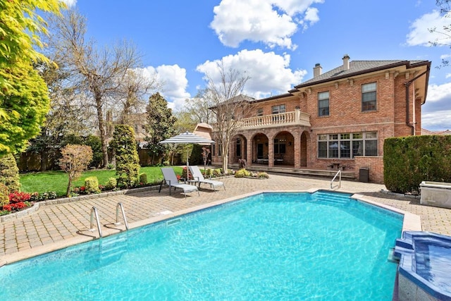 view of pool with a patio