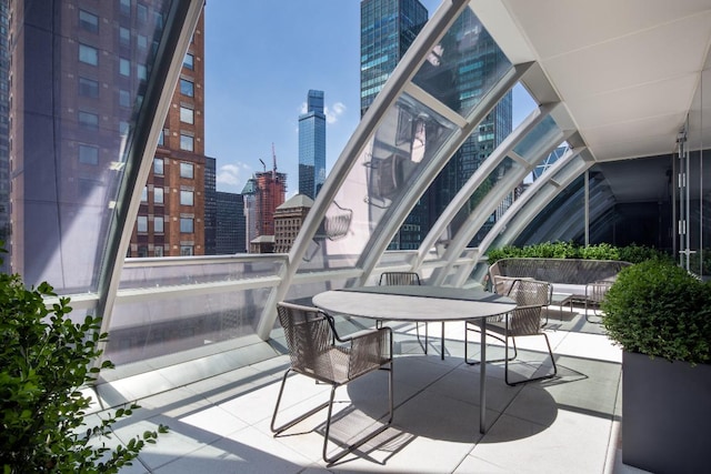 view of patio with a balcony