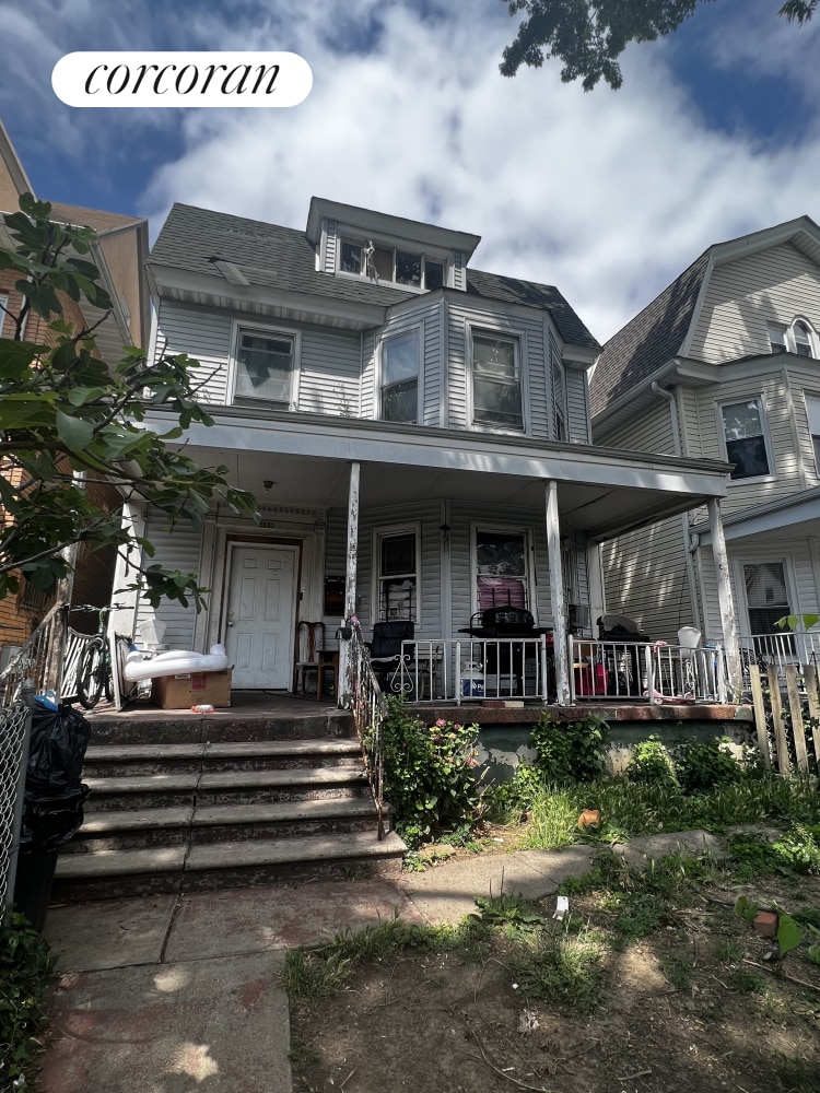 400 E 8th St, New York City, NY 11218 - view of front of house featuring covered porch
