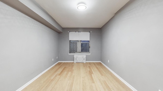 empty room featuring light hardwood / wood-style floors