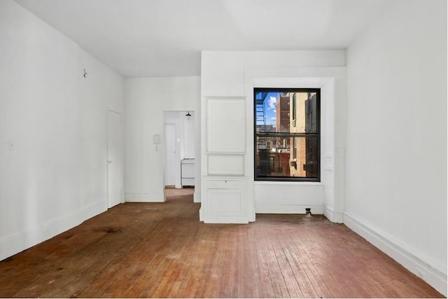 unfurnished bedroom with wood-type flooring