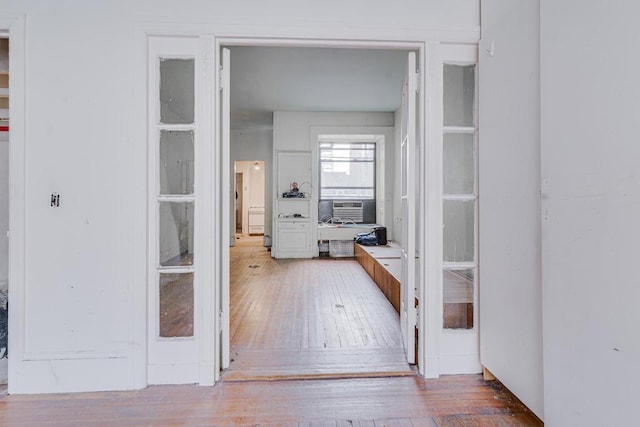 doorway to property featuring cooling unit