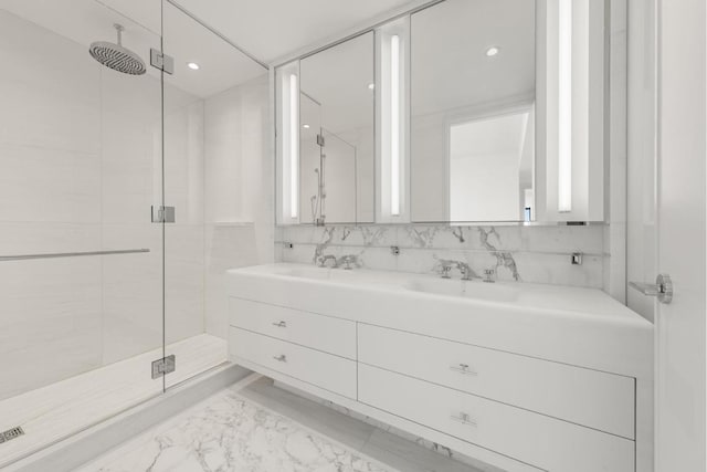 bathroom featuring vanity, an enclosed shower, and decorative backsplash