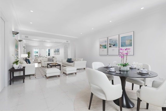 dining space with marble finish floor and recessed lighting