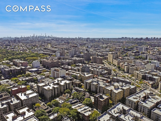 birds eye view of property featuring a view of city