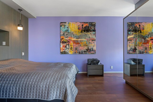 bedroom featuring dark hardwood / wood-style floors