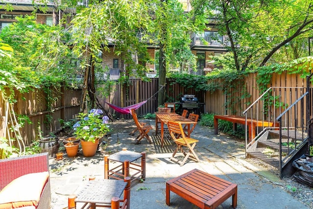 view of patio with a grill